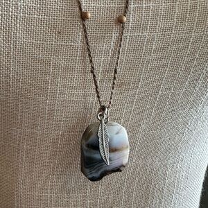 Elegant Silver and Gold Pendant Necklace